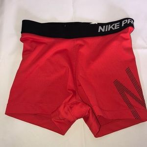 Red Nike pro shorts